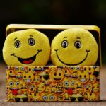 two yellow emoji on yellow case